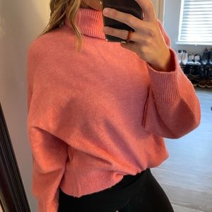 Cozy, light pink H&M turtleneck sweater.
